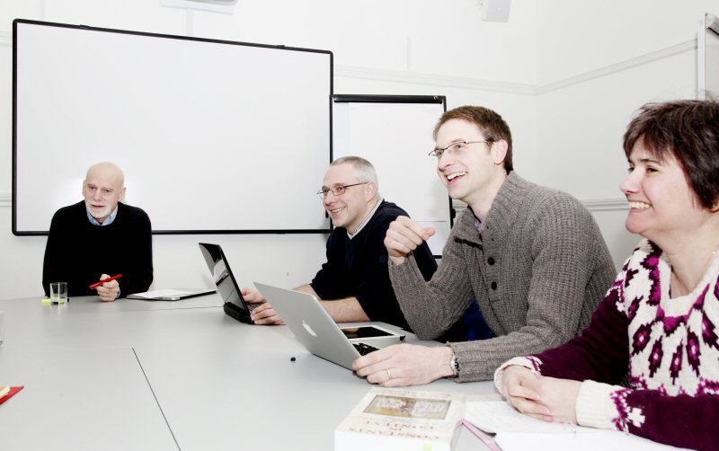 Photograph of Paul Weston with students