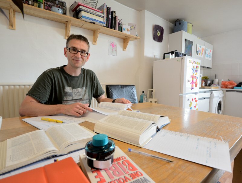 Photograph of a student at table